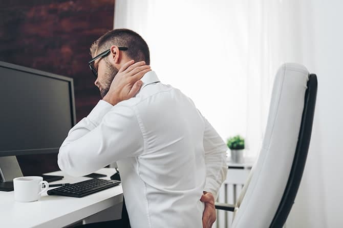 man with pain in his neck seeks pain management